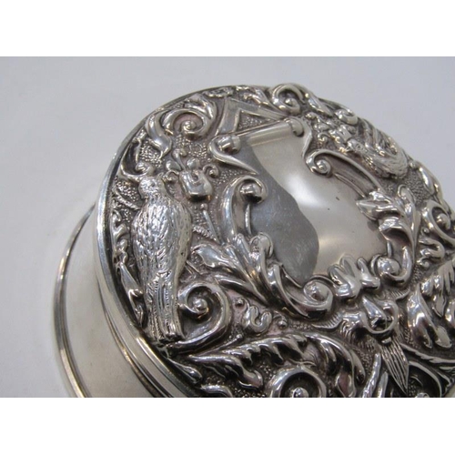 368 - SILVER RING BOX, circular base embossed erden scroll design