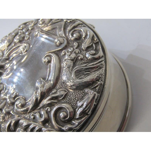 368 - SILVER RING BOX, circular base embossed erden scroll design