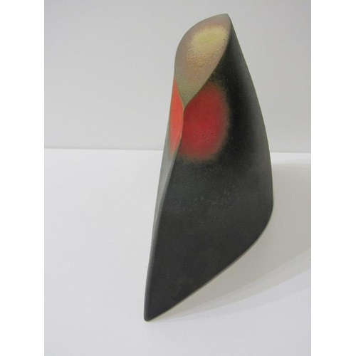 4 - RICHARD GODFREY, sculpture with red and yellow decoration on a black ground, 30cm width