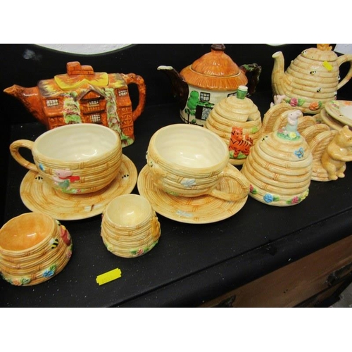 459 - WINNIE THE POOH, collection of border fine art tableware also cottage design teapots