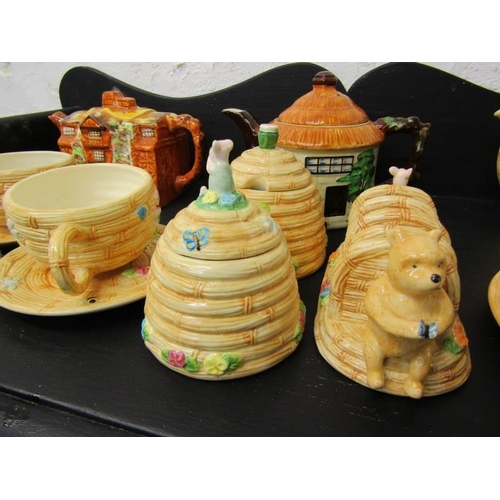 459 - WINNIE THE POOH, collection of border fine art tableware also cottage design teapots