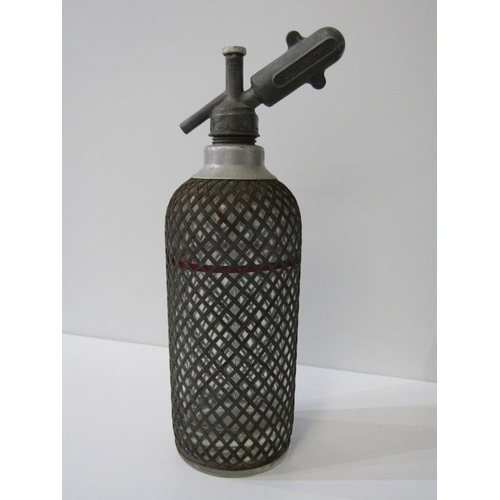 47 - VINTAGE SODA SIPHON, in lattice plated casing