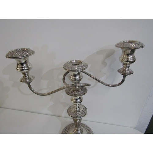 486 - SILVERPLATE,  a pair of plated copper twin branch candelabras