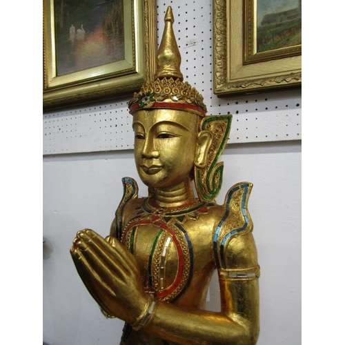 496 - EASTERN SCULPTURE, ornate gilded and encrusted temple figure, 91cm height