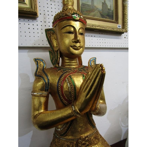 496 - EASTERN SCULPTURE, ornate gilded and encrusted temple figure, 91cm height