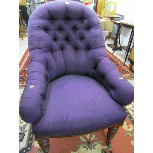 582 - VICTORIAN PURPLE BUTTON BACK ARMCHAIR with original castors