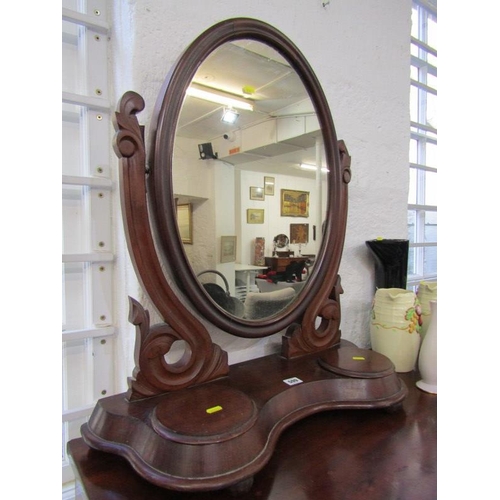 599 - VICTORIAN MAHOGANY CARVED OVAL SWING DRESSING MIRROR