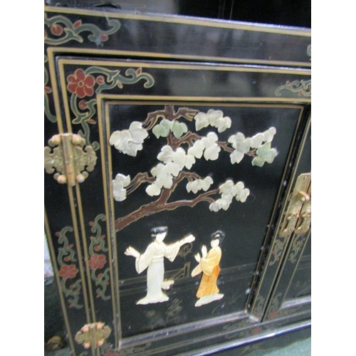 604 - LACQUER FURNITURE,  a gilt and stone inlaid drawer and cupboard base cabinet, 69cm width