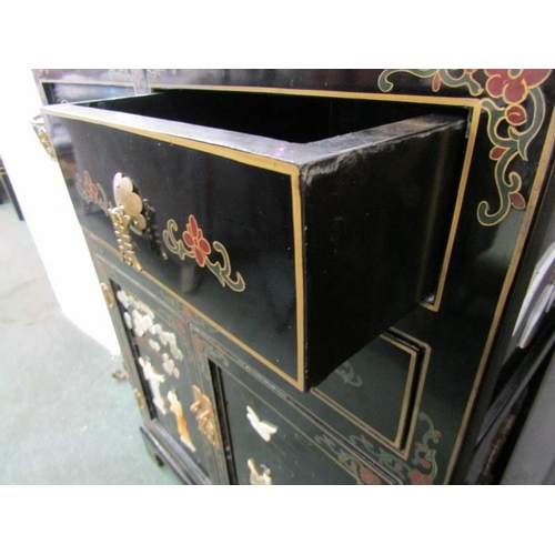 604 - LACQUER FURNITURE,  a gilt and stone inlaid drawer and cupboard base cabinet, 69cm width