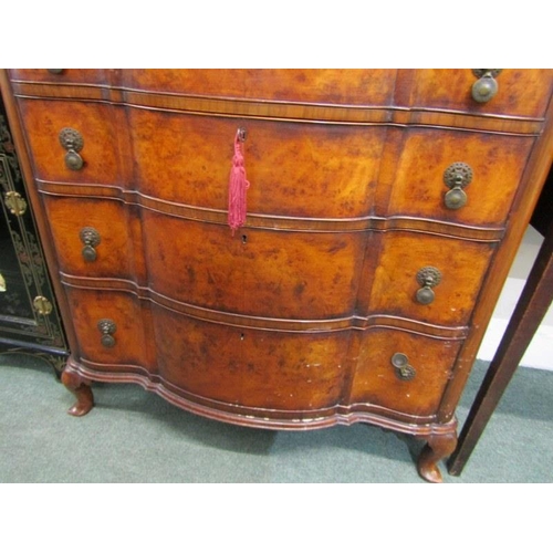 605 - GEORGIAN DESIGN BURR WALNUT SERPENTINE FRONTED CHEST of 4 long graduated drawers with brass disc dro... 