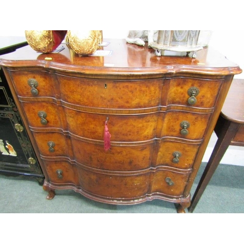 605 - GEORGIAN DESIGN BURR WALNUT SERPENTINE FRONTED CHEST of 4 long graduated drawers with brass disc dro... 