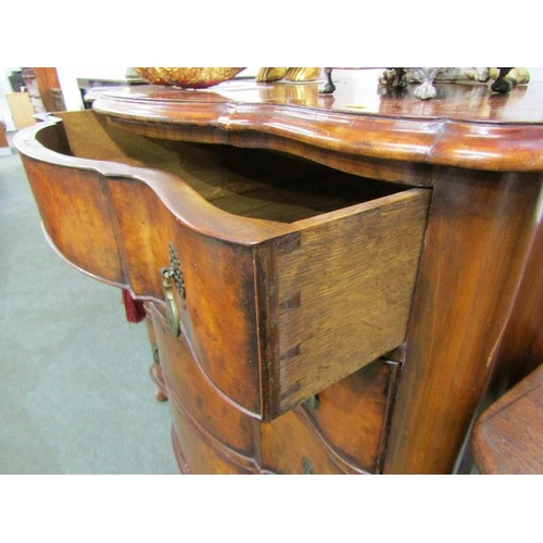 605 - GEORGIAN DESIGN BURR WALNUT SERPENTINE FRONTED CHEST of 4 long graduated drawers with brass disc dro... 