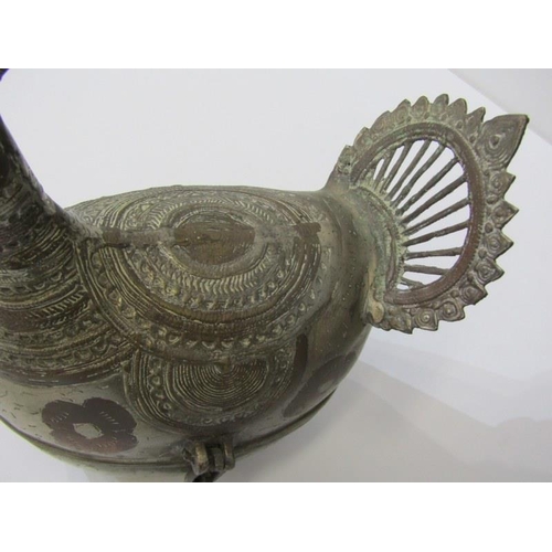 61 - EASTERN METAL PEACOCK FIGURE, Indo Islamic Dhokra plated and brass peacock figure, 20cm