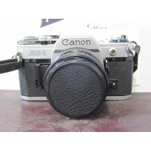 74 - CAMERA EQUIPMENT, Canon AE1 camera with zoom lens, a Yashica-Matt retro camera, together with zoom l... 