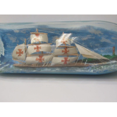 9 - SHIP IN BOTTLE, model of a 3 masted ship in bottle, together with a mdina glass paperweight