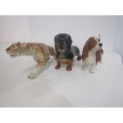 359 - ROYAL DUX/ BESWICK, Royal Dux figure of a tiger 30cms, together with Beswick Dachshund and Basset ho... 