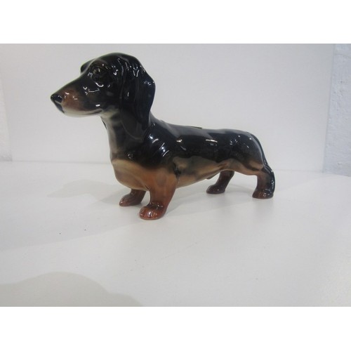 359 - ROYAL DUX/ BESWICK, Royal Dux figure of a tiger 30cms, together with Beswick Dachshund and Basset ho... 