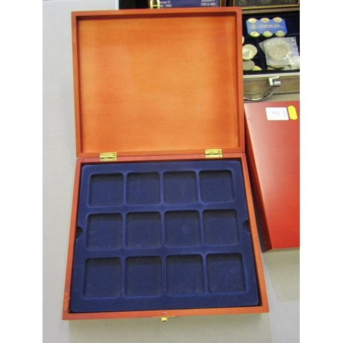 48 - A coin case containing small framed pennies & pre-decimal coins; a collection of 5 pound crowns x 3;... 