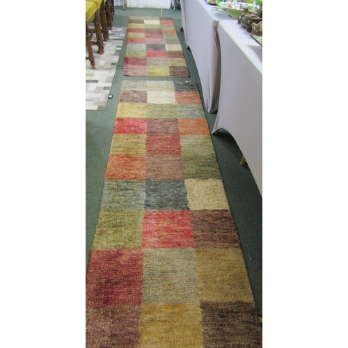 761 - WOOL RUNNER RUGS, pair of multi panel wool runner rugs, 235 cm x 72cm