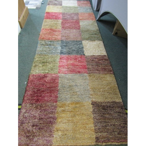 761 - WOOL RUNNER RUGS, pair of multi panel wool runner rugs, 235 cm x 72cm