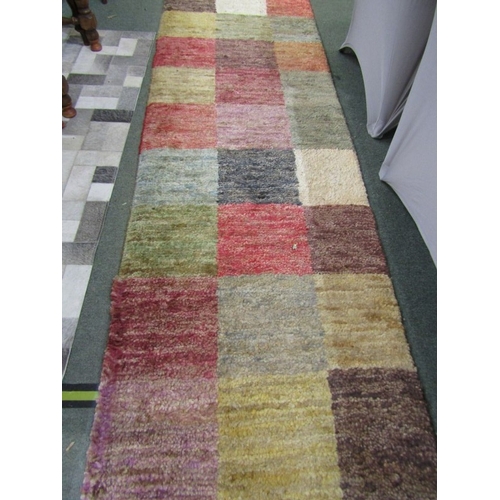 761 - WOOL RUNNER RUGS, pair of multi panel wool runner rugs, 235 cm x 72cm