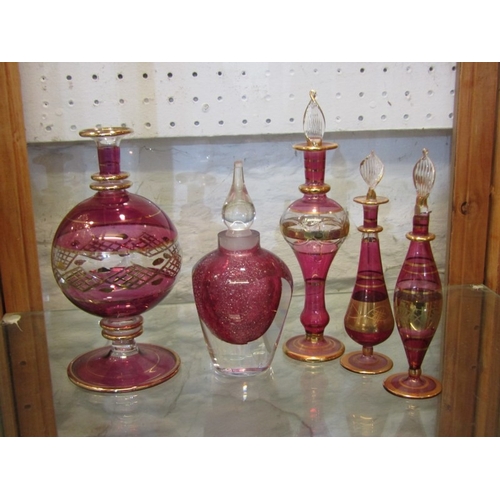 473 - CRANBERRY & RUBY GLASS, Cornucopia vase, Fenton Vase gilded duck paperweight, perfume bottles and co... 