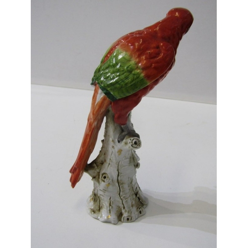 445 - HOCHST PORCELAIN, a parrot on branch, blue circular Hochst mark to base - possibly 18th Century (dam... 