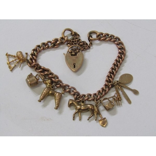 400 - GOLD CHARM BRACELET, 9ct yellow gold charm bracelet with padlock clasp, charms including a poodle, h... 