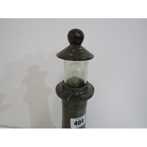 404 - SERPENTINE LIGHTHOUSE LAMP, a Cornish serpentine lamp on rocky base, height 38cm
