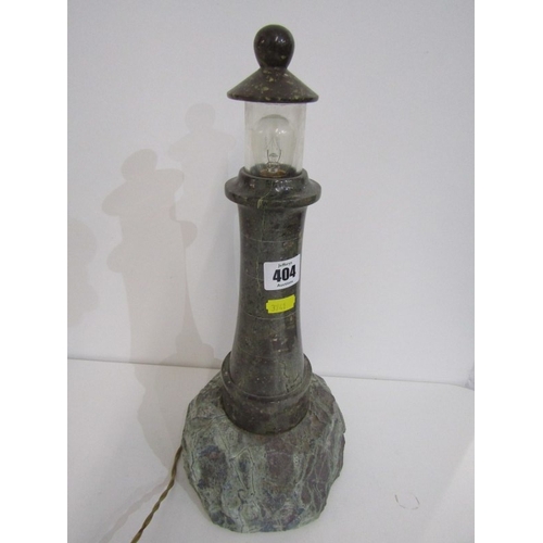 404 - SERPENTINE LIGHTHOUSE LAMP, a Cornish serpentine lamp on rocky base, height 38cm