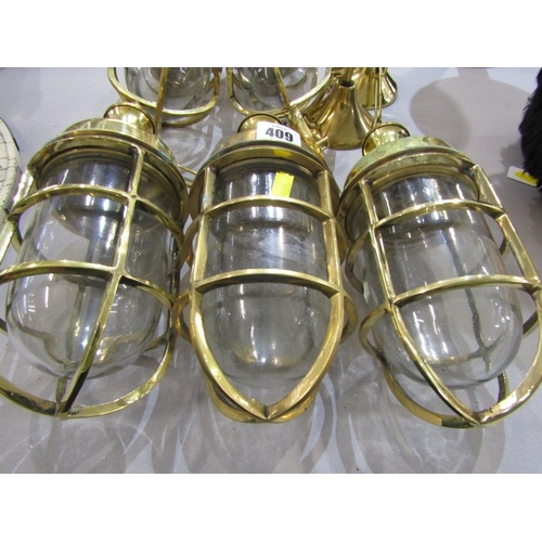409 - LIGHT FITTINGS, 8 various brass bound ship's light fittings