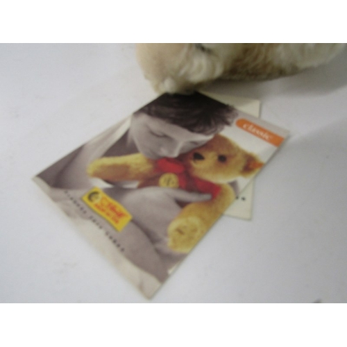 412 - STEIFF TEDDIES, 2 Steiff teddy bears; blonde classic 1920 teddy bear, no 000645 and black Original b... 