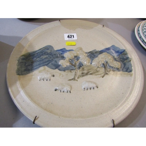 421 - STUDIO POTTERY, an Isle of Arran pottery plate depicting sheep together with other various studio ju... 