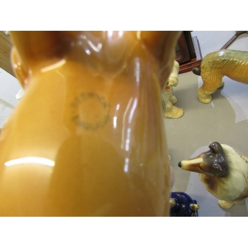 424 - BESWICK HORSE, a model of a Beswick Horse (damaged ear) together with 4 various pottery dog ornament... 