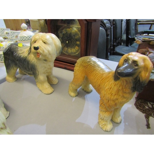 424 - BESWICK HORSE, a model of a Beswick Horse (damaged ear) together with 4 various pottery dog ornament... 