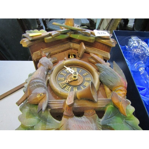 426 - CUCKOO CLOCK, a wood cased Black Forest type cuckoo clock