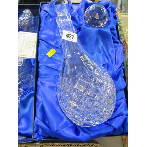 427 - GLASSWARE, a Royal Scot Crystal boxed decanter and stopper together with a boxed set of 6 glasses