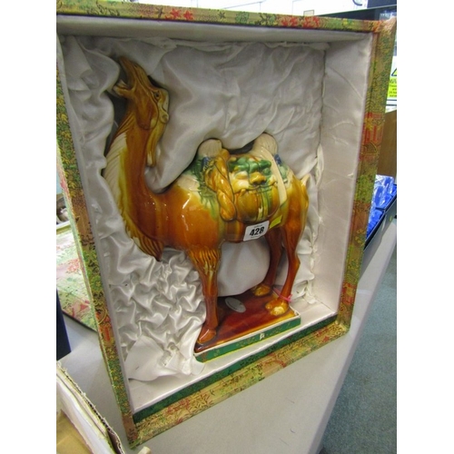 428 - BOXED ORIENTAL POTTERY CAMEL, Tang style camel figure in 1960s retail box