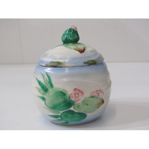 434 - CLARICE CLIFF, Clarice Cliff floral decorated conserve with lid, 10cm height