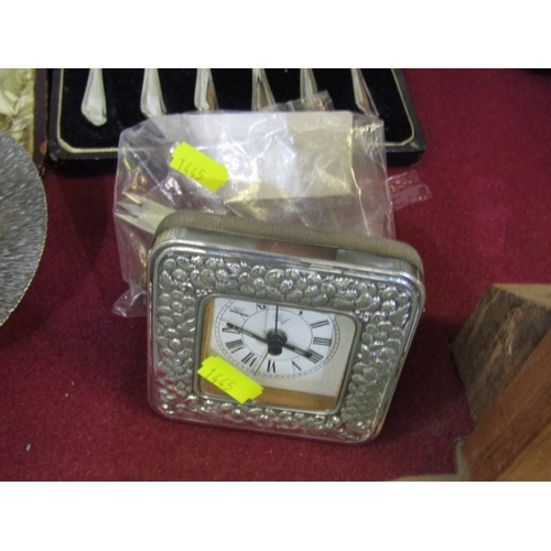 442 - PLATED CUTLERY & SILVER FACED CLOCK, GG battery watch with a foliate silver front, plated anointing ... 