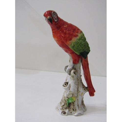 445 - HOCHST PORCELAIN, a parrot on branch, blue circular Hochst mark to base - possibly 18th Century (dam... 