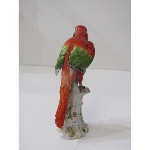 445 - HOCHST PORCELAIN, a parrot on branch, blue circular Hochst mark to base - possibly 18th Century (dam... 