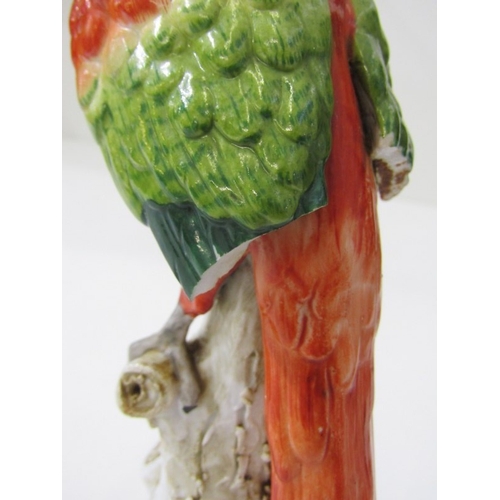 445 - HOCHST PORCELAIN, a parrot on branch, blue circular Hochst mark to base - possibly 18th Century (dam... 