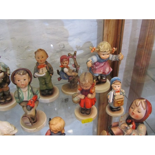 451 - HUMMEL POTTERY, various Hummel pottery figures including Appletree Girl & Skier (13 items)