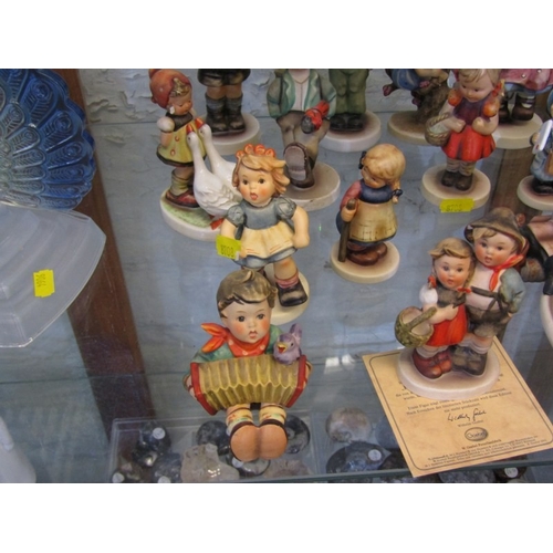 451 - HUMMEL POTTERY, various Hummel pottery figures including Appletree Girl & Skier (13 items)