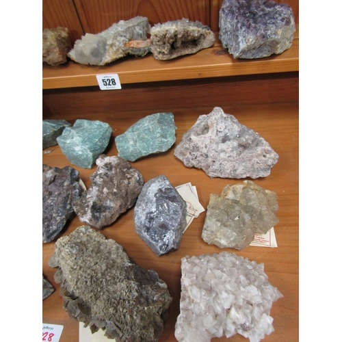 528 - MINERALS, several uncut minerals, including amethyst, fluorite, calcite, etc