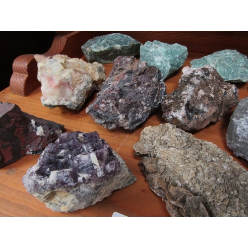 528 - MINERALS, several uncut minerals, including amethyst, fluorite, calcite, etc