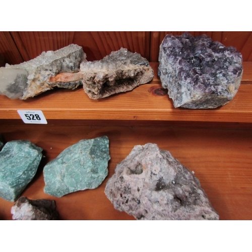 528 - MINERALS, several uncut minerals, including amethyst, fluorite, calcite, etc