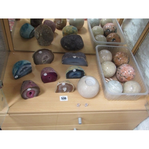 536 - MINERAL GEODES, 7 assorted mineral geodes, together with a stone candle holder and polished stone ba... 