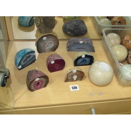 536 - MINERAL GEODES, 7 assorted mineral geodes, together with a stone candle holder and polished stone ba... 